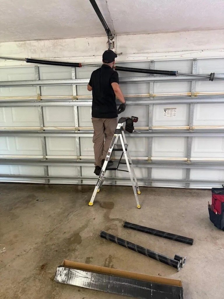 Garage Door Cable Repair work on a garage door