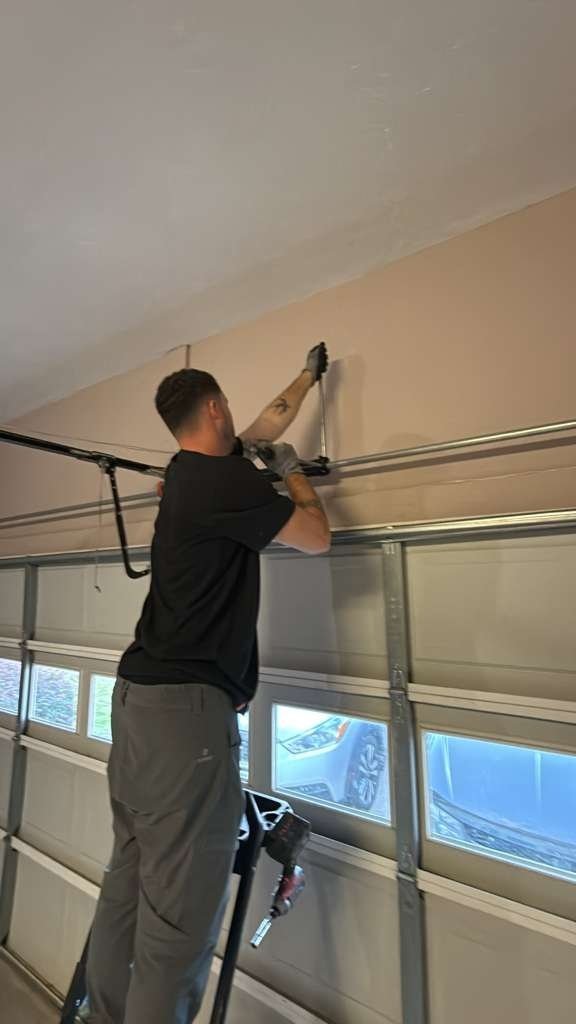 Garage Door Cable Repair work on a garage door